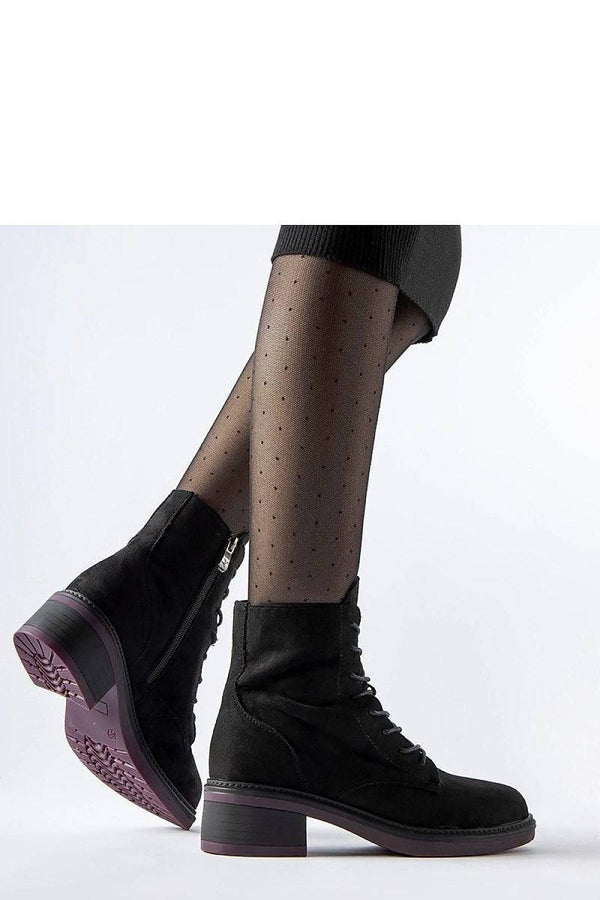 Bottines classiques noires à talons et semelle violette