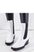 Heel boots - white ankle boots with square toe and block heel, styled with black leggings for autumn fashion appeal.
